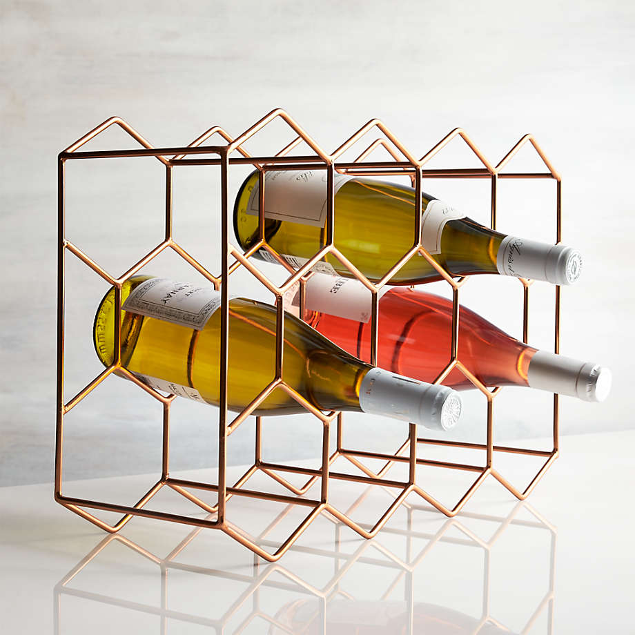 https://cb.scene7.com/is/image/Crate/11BottleWineRackCopperSHF16/$web_pdp_main_carousel_med$/220913133203/11-bottle-wine-rack-copper.jpg