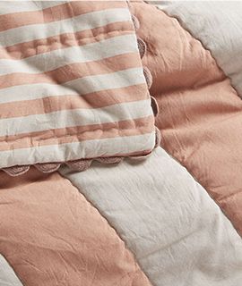 Riviera Terracotta Pink Stripe Organic Cotton Crib Quilt