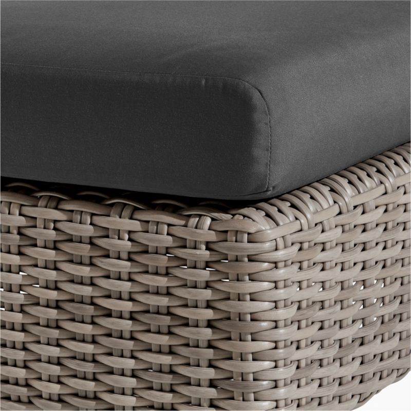 Abaco Resin Wicker Outdoor Ottoman with Cast Charcoal Sunbrella ® Cushion
