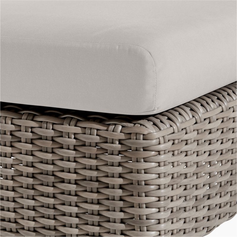 Abaco Resin Wicker Outdoor Ottoman with Cast Silver Sunbrella ® Cushion