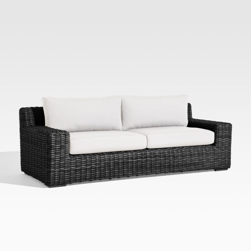 Abaco 83" Resin Wicker Charcoal Grey Outdoor Sofa with White Sand Sunbrella ® Cushion