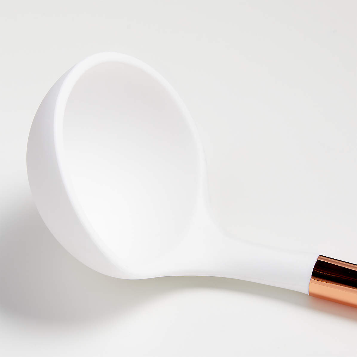 Crate&Barrel Ada White Silicone Slotted Spoon with Copper Handle