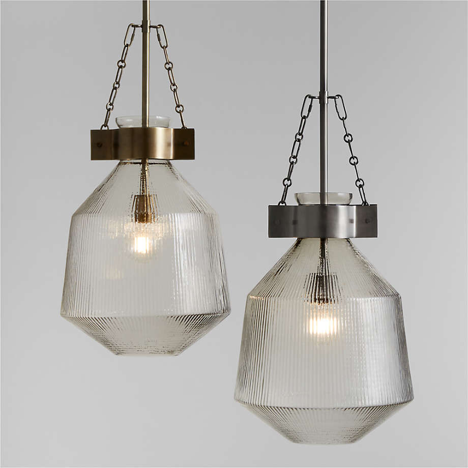 https://cb.scene7.com/is/image/Crate/AidenRbdGlsKtchPndtsAVFSSF22/$web_pdp_main_carousel_med$/221021131312/aiden-ribbed-glass-pendant-lights.jpg