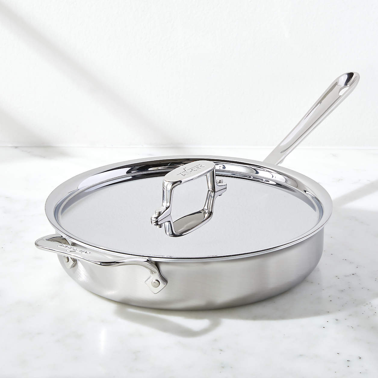 All Clad D Brushed Stainless Steel Quart Saut Pan With Lid Reviews Crate Barrel Canada