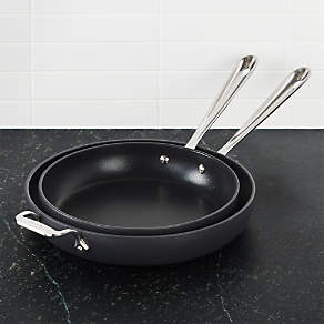 https://cb.scene7.com/is/image/Crate/AllCladHA110N12inFryPanSetSHS19/$web_pdp_carousel_low$/190411134736/all-clad-ha1-fry-pans-set-of-2.jpg
