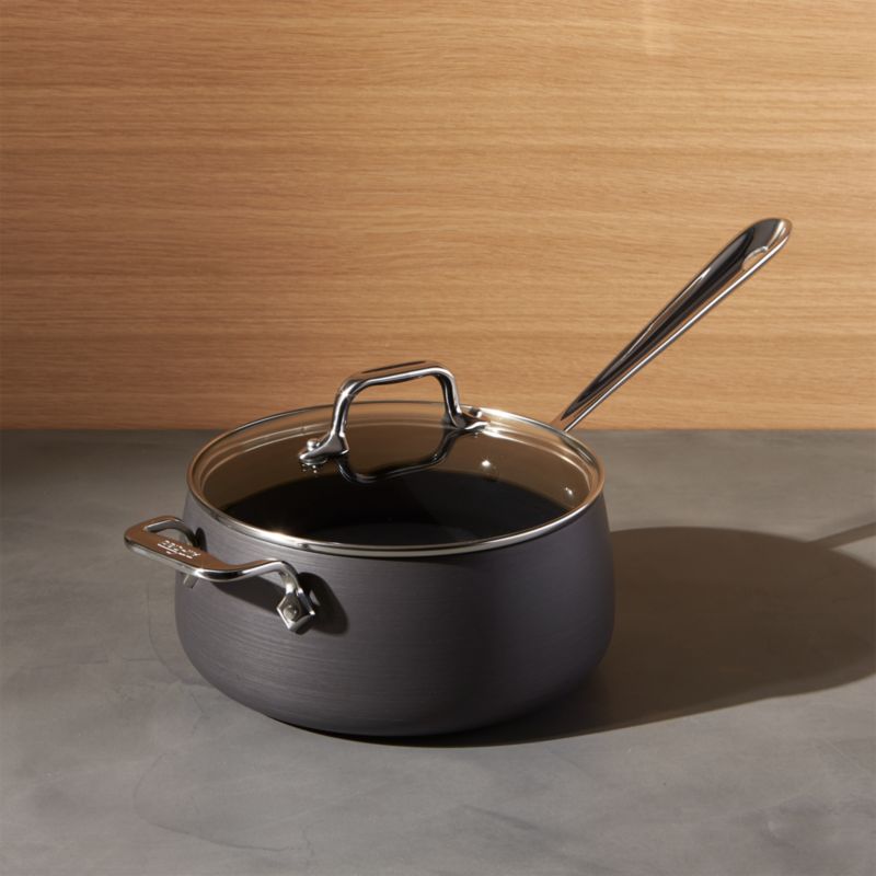 All-Clad HA1 Nonstick Universal Pan with Lid, Acacia Wood Trivet and Spoon · 3 Quart