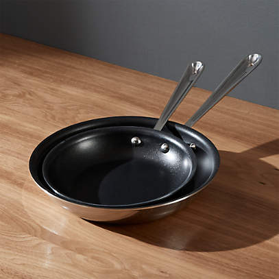 https://cb.scene7.com/is/image/Crate/AllCladSSNostkPanSet8n10inSHF16/$web_pdp_main_carousel_low$/220913133259/all-clad-stainless-non-stick-fry-pans.jpg