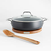 https://cb.scene7.com/is/image/Crate/AllCldHA1NS4qStsLdAWTvSpSSF22/$web_recently_viewed_item_xs$/220812132029/all-clad-ha1-non-stick-4-qt.-sauteuse-pan-with-lid-acacia-wood-trivet-and-spoon.jpg