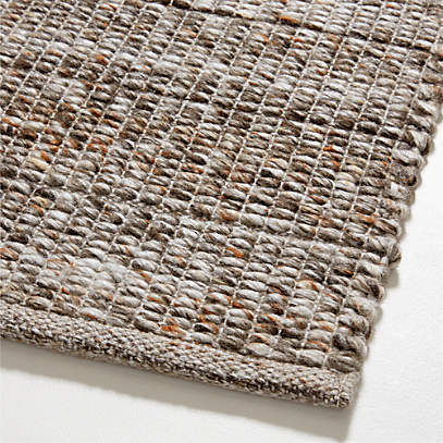 https://cb.scene7.com/is/image/Crate/AndaluciaTaupe9x12RugROF23/$web_pdp_main_carousel_low$/230720184018/andalucia-wool-blend-handwoven-taupe-brown-rug-swatch-12x18.jpg