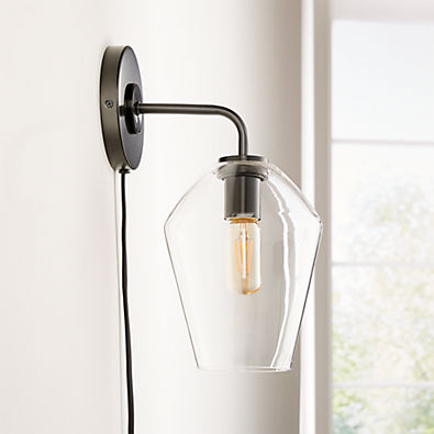 View Arren Black Plug In Wall Sconce Light with Clear Angled Shade details