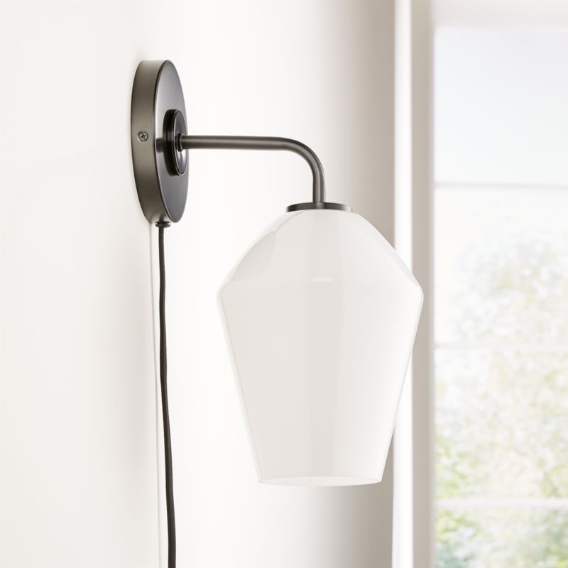 Arren Black Plug In Wall Sconce Light with Milk Angled Shade
