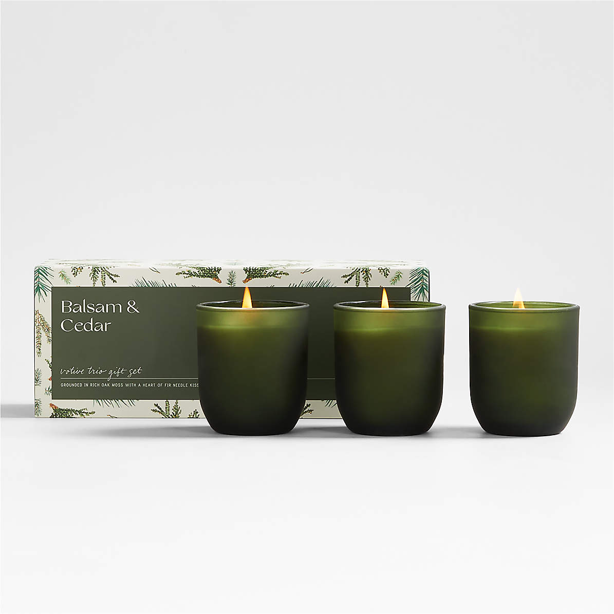 https://cb.scene7.com/is/image/Crate/BalsamCedarTrioCandleSetSSF23/$web_pdp_main_carousel_zoom_med$/230613155018/illume-balsam-and-cedar-trio-holiday-candle-set.jpg