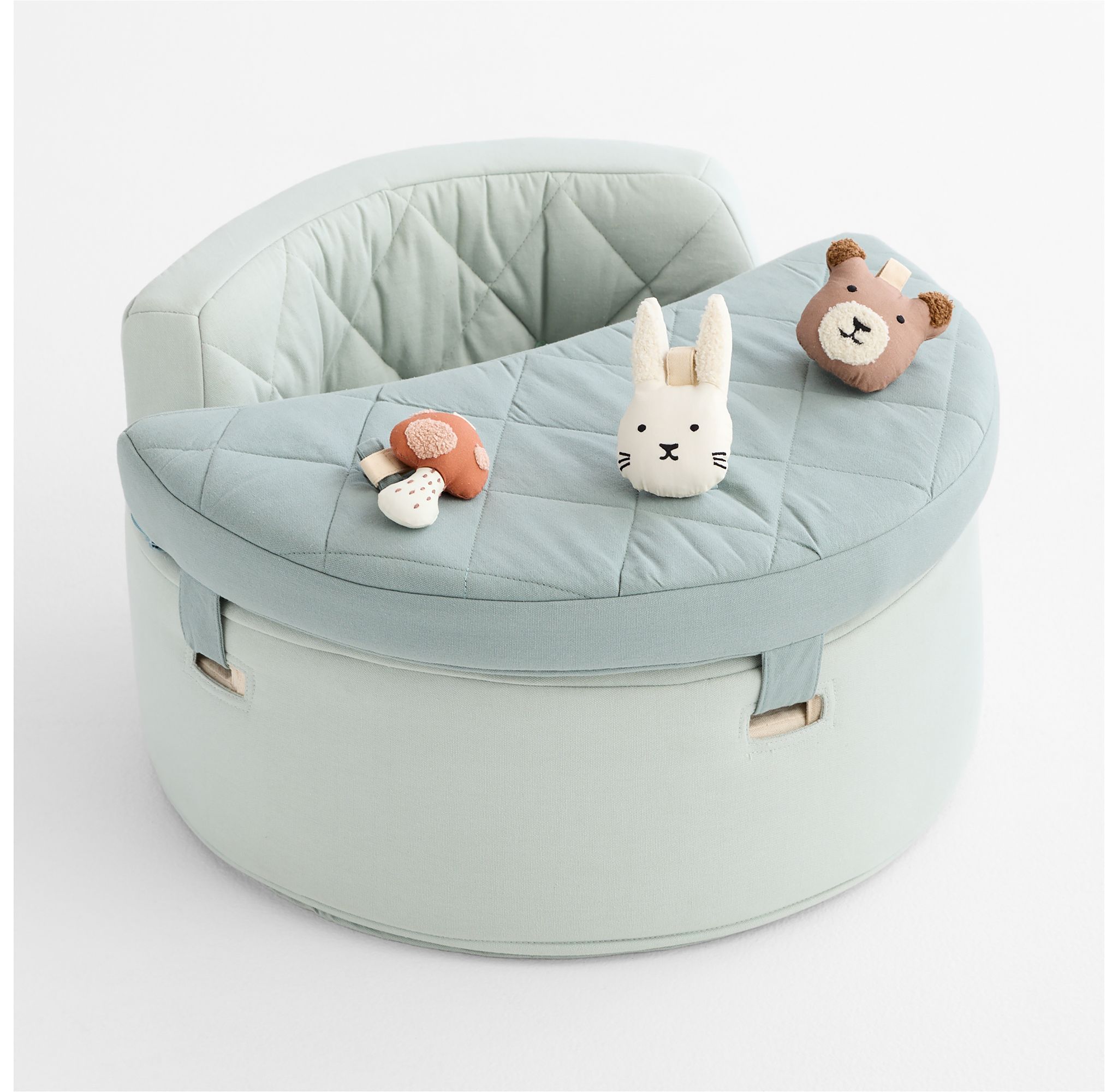 Three-quarter view of the green baby activity chair with rattle set.