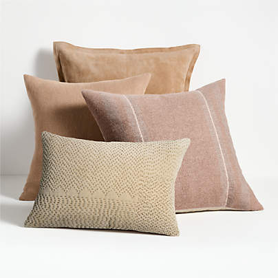 Beige and Tan Throw Pillow Arrangement