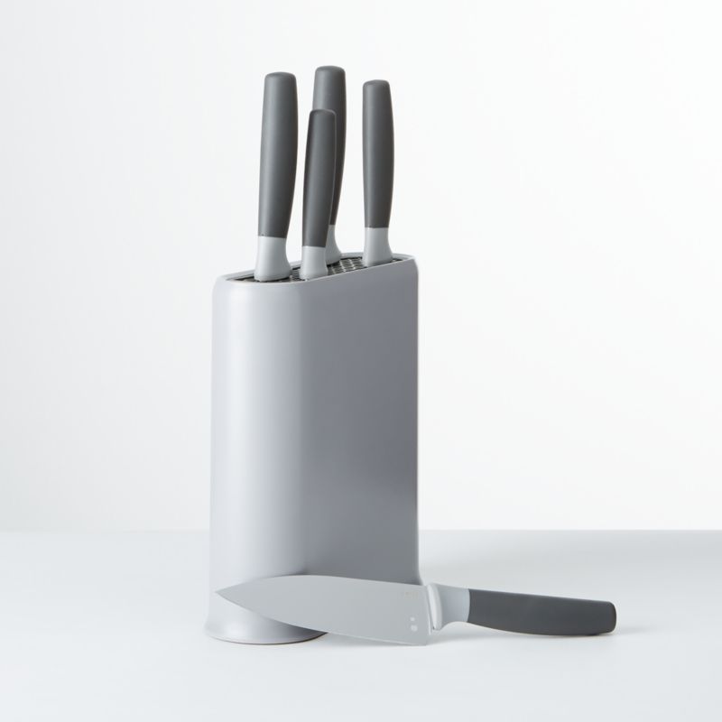 grey knife block with knives