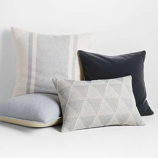 Solid Blue & Patterned Pillow Arrangement