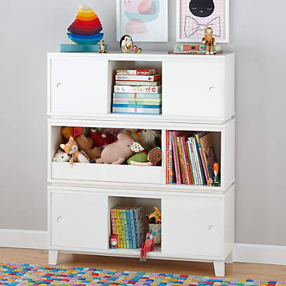 https://cb.scene7.com/is/image/Crate/Bookcase_District_Cube_WH_Group/$web_pdp_main_carousel_low$/210416111234/district-storage-bench-bookcase-white.jpg