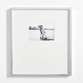 https://cb.scene7.com/is/image/Crate/BrushedSlvMtlFrm15x17HzSSF23/$web_pdp_carousel_low$/230515164005/brushed-silver-metal-picture-frame-with-horizontal-white-mat-5x7.jpg