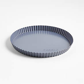 https://cb.scene7.com/is/image/Crate/CBBakeware10inTartPanBLSSF23/$web_pdp_carousel_low$/230510125004/crate-and-barrel-10-slate-blue-tart-pan-with-removable-bottom.jpg