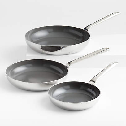 https://cb.scene7.com/is/image/Crate/CBEvnckCrCrmcFryPanS3SSF22/$web_pdp_main_carousel_low$/220505165922/crate-and-barrel-evencook-core-ceramic-non-stick-fry-pans-set-of-3.jpg