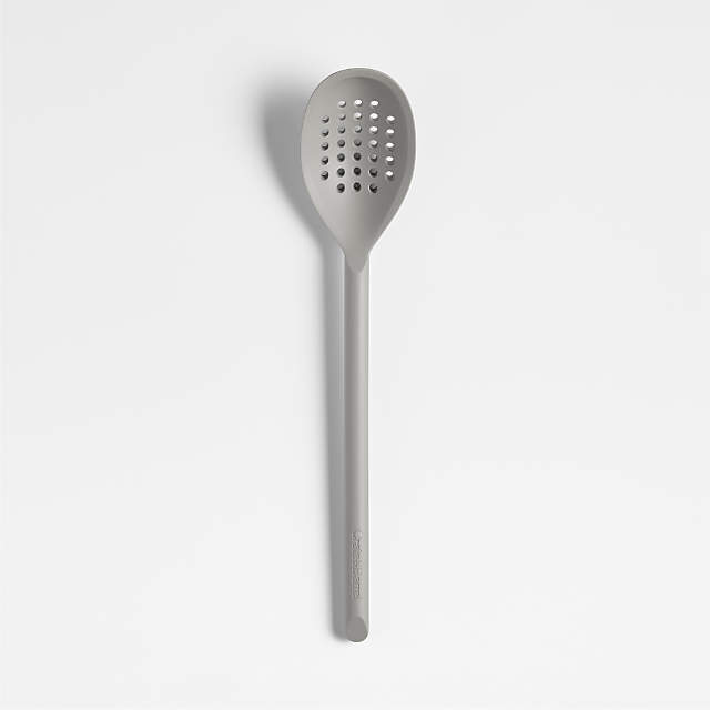 https://cb.scene7.com/is/image/Crate/CBGrySlcnDpSltdSpoonSSS24/$web_pdp_main_carousel_zoom_low$/231207215503/crate-and-barrel-grey-silicone-deep-slotted-spoon.jpg