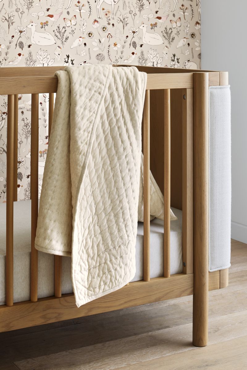 Redondo Upholstered Wood Baby Crib with Toddler Bed Rail