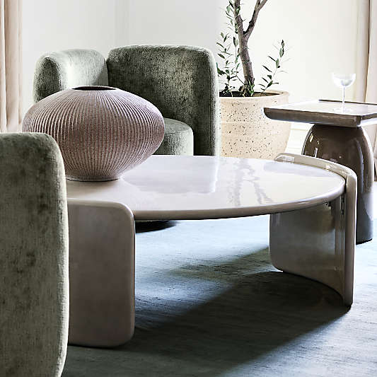 Sand Dune 50.5" Round High Gloss Coffee Table by Brigette Romanek