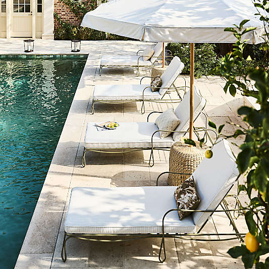 The Cobden 9' Round Outdoor Umbrella with Felix Wicker Base Side Table by Jake Arnold