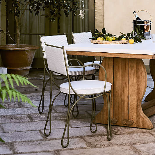 The Harpen Metal Outdoor Dining Arm Chair by Jake Arnold