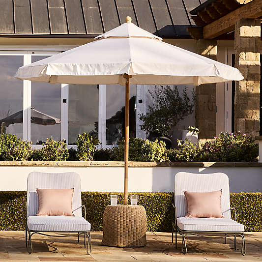 The Cobden 9' Round Outdoor Umbrella with Felix Wicker Base Side Table by Jake Arnold