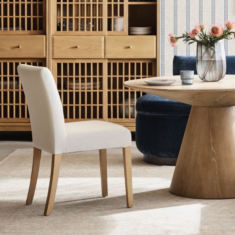 Viewing product image Lowe Ivory Upholstered Dining Chair with Natural Wood Legs - image 1 of 11