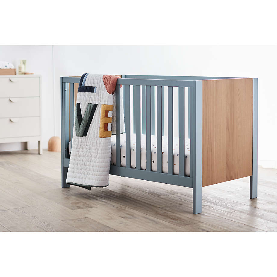 Grey wood store baby crib