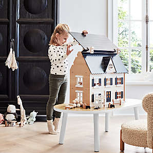 Wooden children's toy with movement top