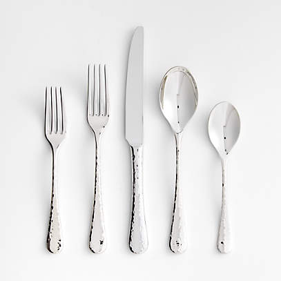 https://cb.scene7.com/is/image/Crate/CaesnaTxt5pFltwrPlcstngSSS24/$web_pdp_main_carousel_low$/231207215503/caesna-texture-flatware-place-setting.jpg