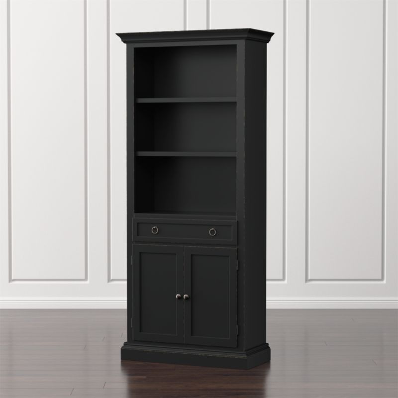 Black bookcase deals with doors