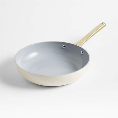 https://cb.scene7.com/is/image/Crate/CarawayFryPanCrmGldSSS23/$web_pdp_carousel_med$/221209115028/caraway-cream-non-stick-ceramic-fry-pan-with-gold-hardware.jpg