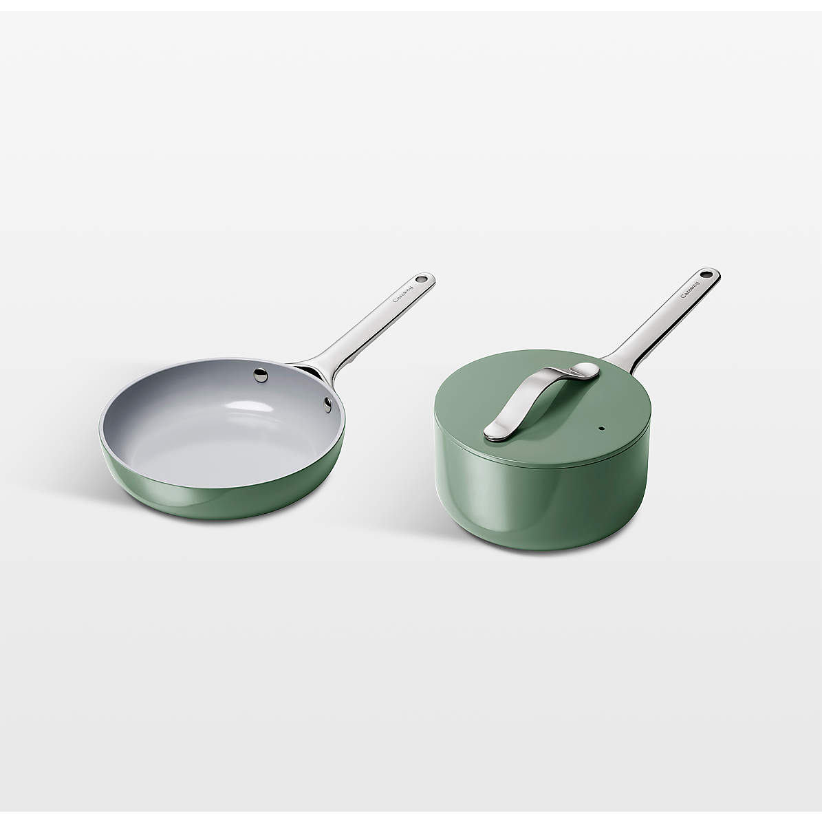 https://cb.scene7.com/is/image/Crate/CarawayMiniDuoSageSSF23_VND/$web_pdp_main_carousel_zoom_med$/230711122349/caraway-home-sage-mini-cookware-duo.jpg