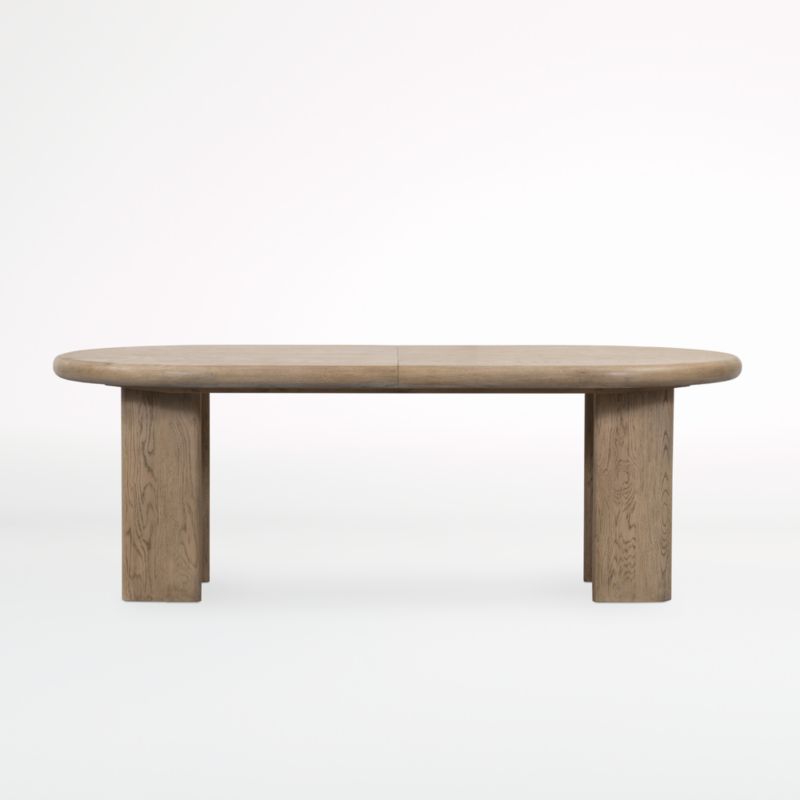 Carrington 87"-107" Wood Oval Extendable Dining Table