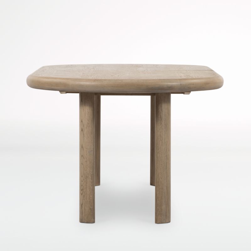 Carrington 87"-107" Wood Oval Extendable Dining Table