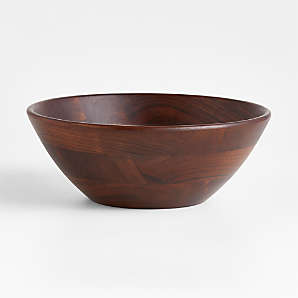 https://cb.scene7.com/is/image/Crate/CarsonDkWoodMedBowlSSS24/$web_plp_card_mobile$/231019034952/carson-medium-dark-acacia-wood-bowl.jpg