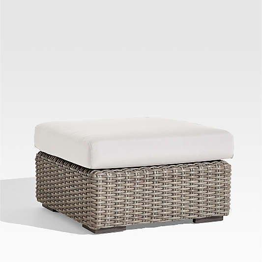 Abaco Resin Wicker Outdoor Ottoman with White Sand Sunbrella ® Cushion