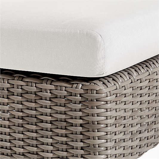 Abaco Resin Wicker Outdoor Ottoman with White Sand Sunbrella ® Cushion