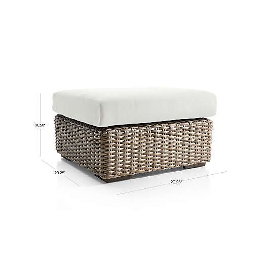 Abaco Resin Wicker Outdoor Ottoman with White Sand Sunbrella ® Cushion