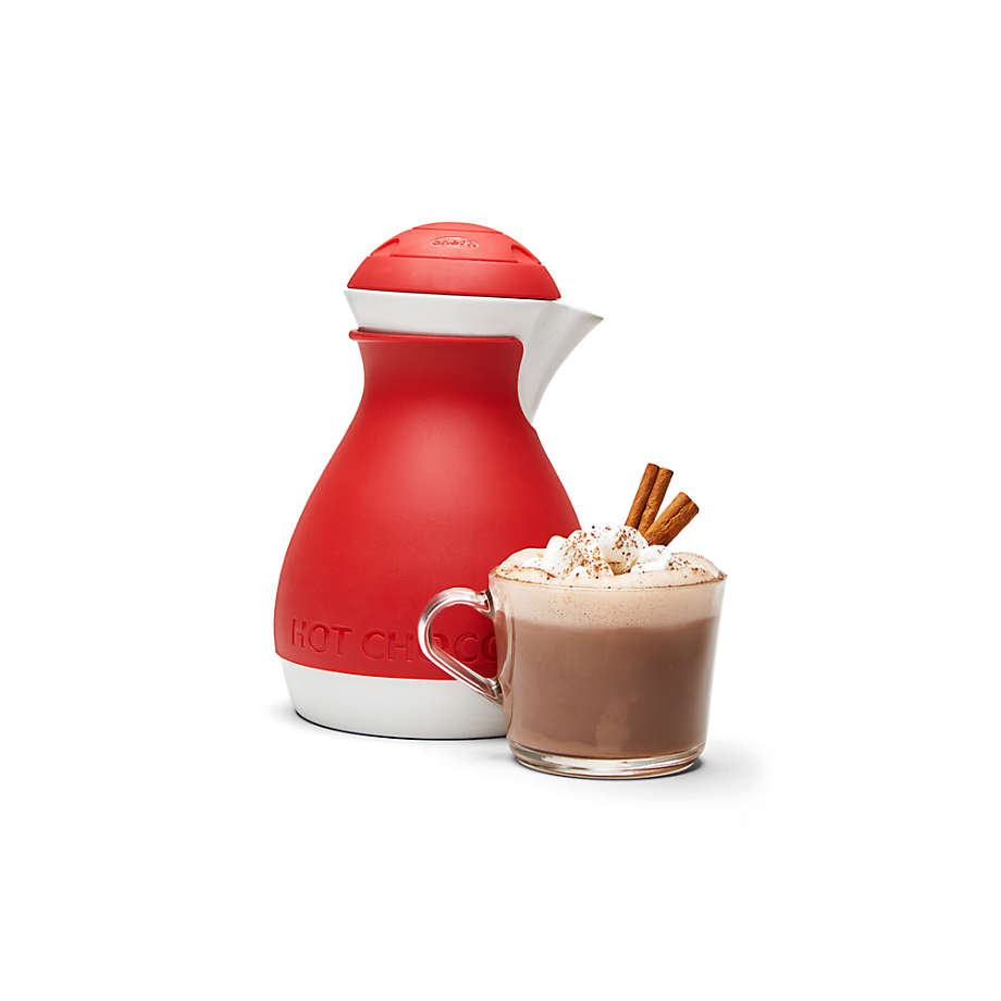 The hot chocolate comes in a large carafe with a side of fresh