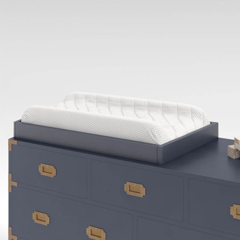 https://cb.scene7.com/is/image/Crate/CmpnWdDrNvWUnvChgTpNvAVSSS21_3D/raw/210402144447/navy-blue-changing-table-topper.jpg