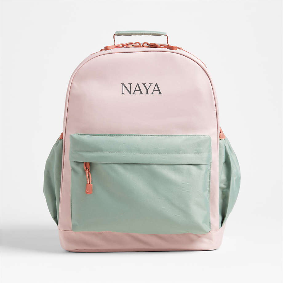 https://cb.scene7.com/is/image/Crate/ColorblckPinkBckpckLrgPRSHSSS23/$web_pdp_main_carousel_med$/230608171349/colorblock-pink-and-mint-green-large-kids-backpack-with-side-pockets.jpg