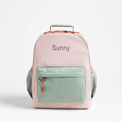 https://cb.scene7.com/is/image/Crate/ColorblckPinkBckpckMedPRSHSSS23/$web_pdp_main_carousel_low$/230608171350/colorblock-pink-and-mint-green-medium-kids-backpack-with-side-pockets.jpg