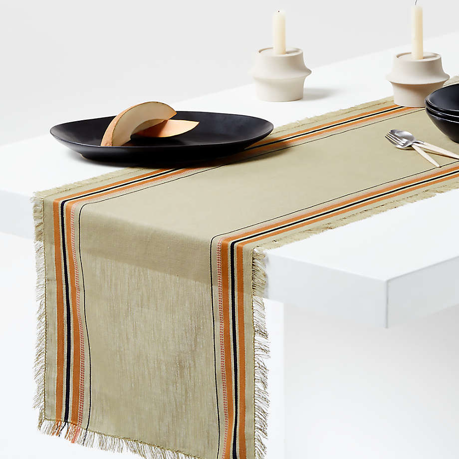 https://cb.scene7.com/is/image/Crate/CraftOrgCtnFrgRnnrGrnStrSSS23/$web_pdp_main_carousel_med$/221215154413/craft-green-stripe-organic-cotton-fringe-table-runner.jpg