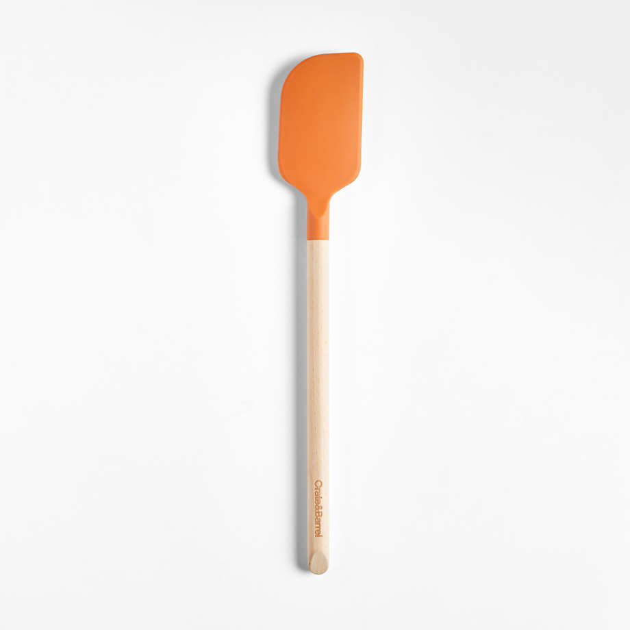 https://cb.scene7.com/is/image/Crate/CrateKtchnSlSSSpatulaBRdSSS22/$web_pdp_main_carousel_med$/220106113022/silicone-and-wood-spatula-red.jpg