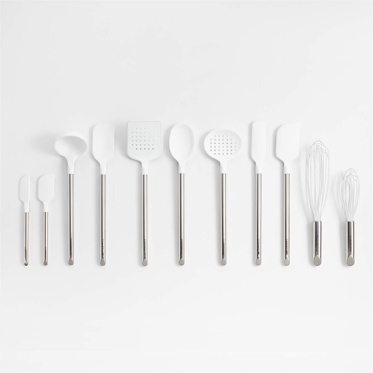 https://cb.scene7.com/is/image/Crate/CrateKtchnSlSSUtnslS11WhtSSS22/$web_pdp_main_carousel_zoom_med$/220106113027/cratekitchen-silicone-and-stainless-white-utensil-set.jpg